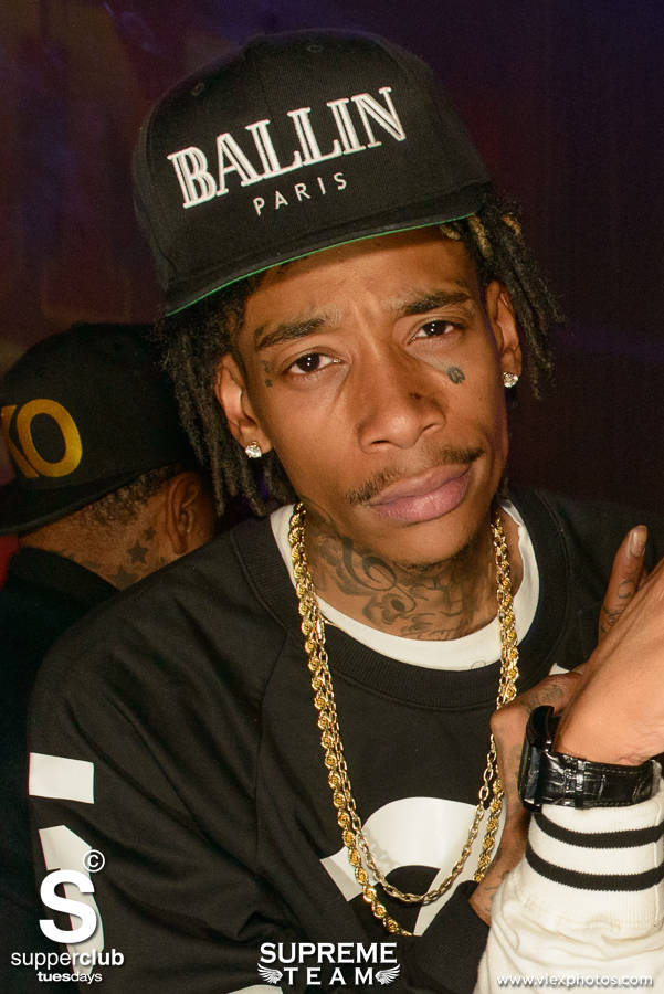 Wiz Khalifa mean mugs for the cameras at Supperclub.