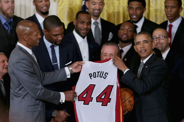 Ray Allen holds a special jersey for the President, perfectly labeled POTUS.