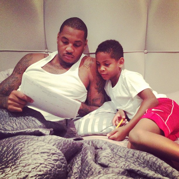 Proud Dad! LaLa shared this photo of Melo helping Kiyan with his homework.