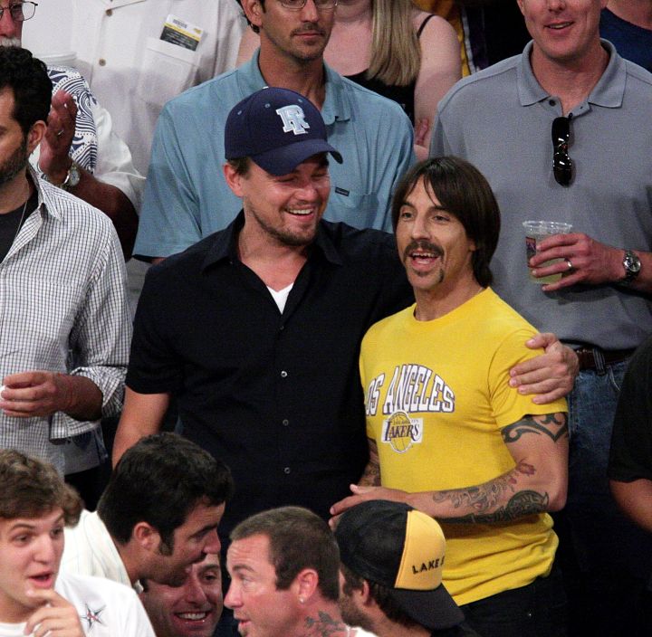 DiCaprio seems to be his happiest when he’s around sports and friends…