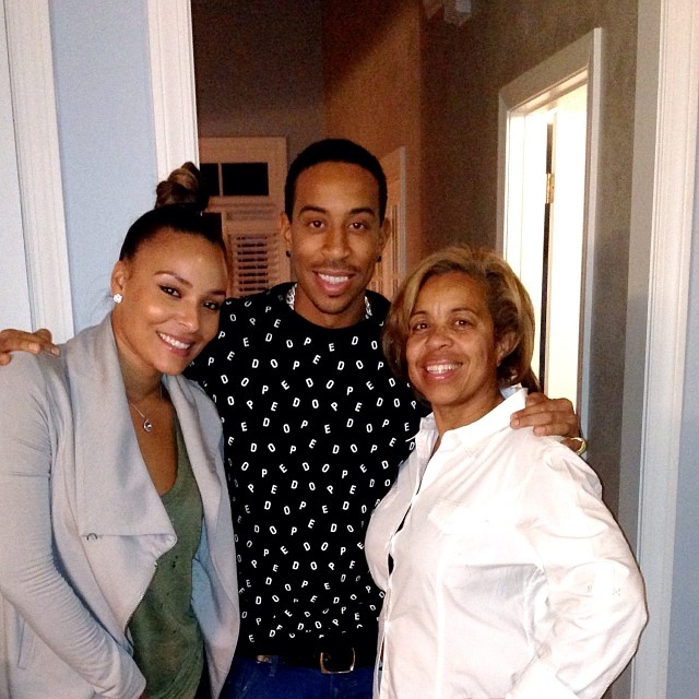 Family First! Luda takes a photo with his favorite women.
