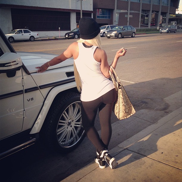 Blac Chyna shows off her booty in black leggings.