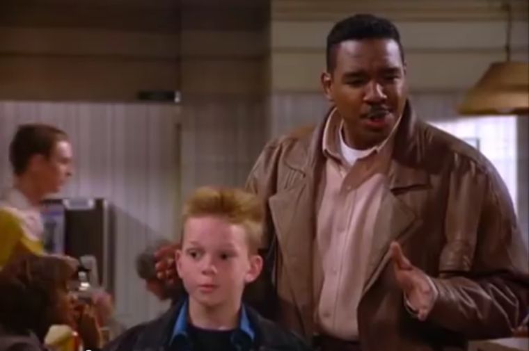 Alec, the big brother from “The Raincoats” (1994)