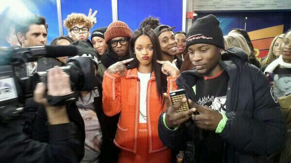 Rihanna flicks it up with the men of the Full House at Good Morning America.
