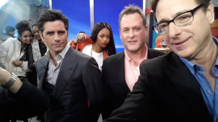 Rihanna flicks it up with the men of the Full House at Good Morning America.