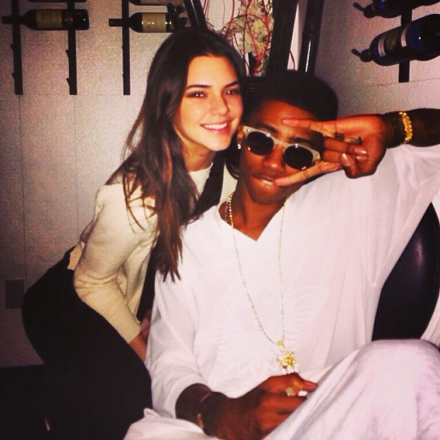 Kendall Jenner flicks it up with YMCMB rapper Lil Twist for his 21st birthday.