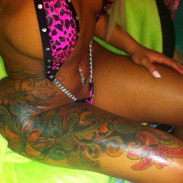 Blac Chyna shows off her booty and tattoos and the same damn time.