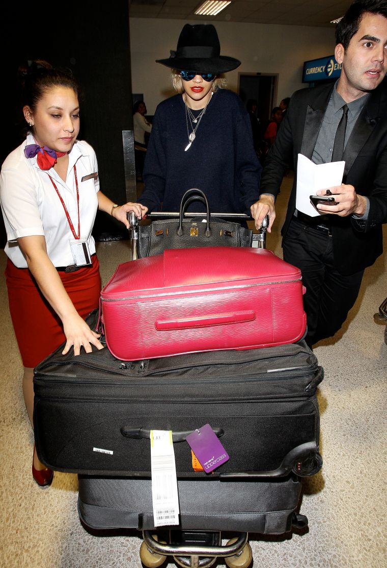 Rita Ora touches down in L.A. in style – and with lots of baggage.