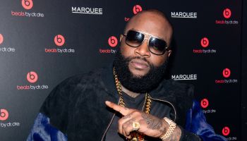 rick ross pointing sunglasses beats by dre event