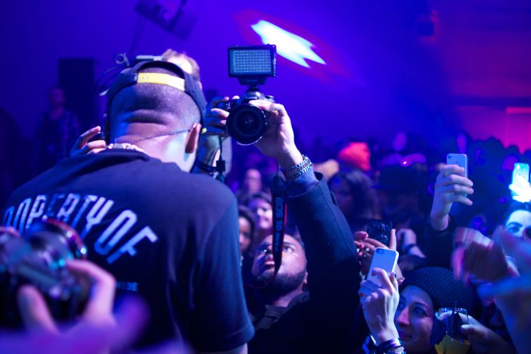 Nas gets the crowd hype.