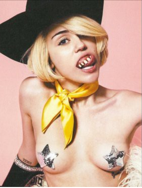 Miley shows off some disgustingly dope grillz.