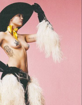 Miley gets in touch with her Southern roots in a cowboy hat and star pasties.