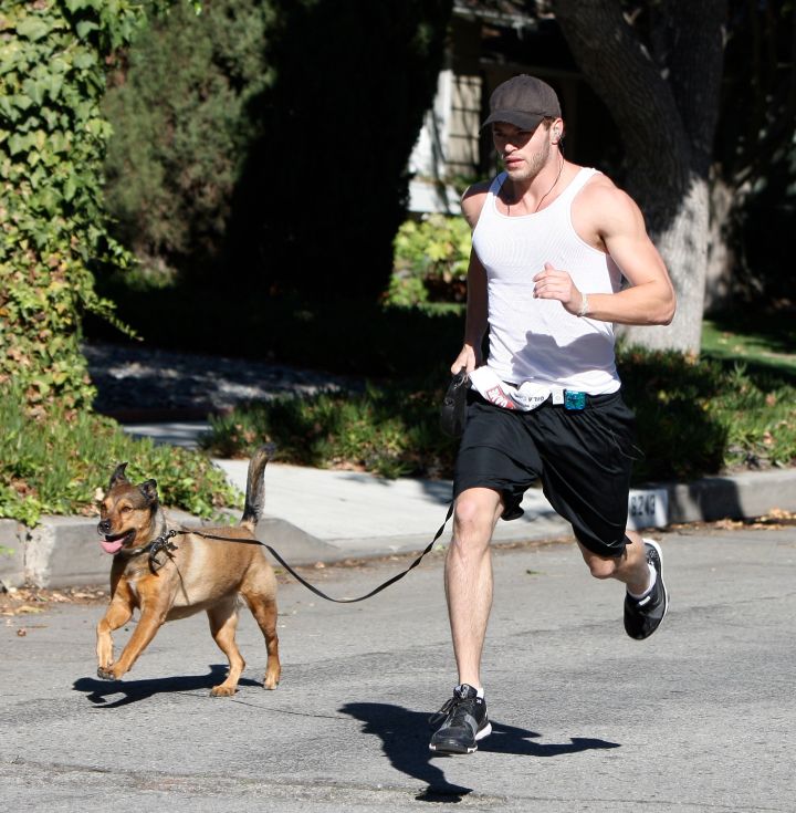 Kellan Lutz out and about with his dog.