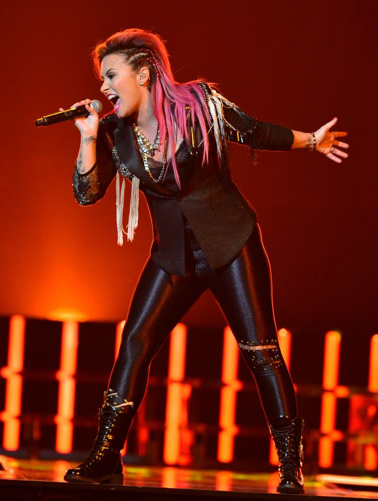 Demi Lovato rocked out while performing live in concert at BB and T Center.