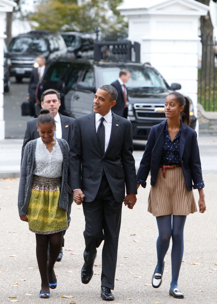 Sasha and Malia play with patterns and attend church with the President.