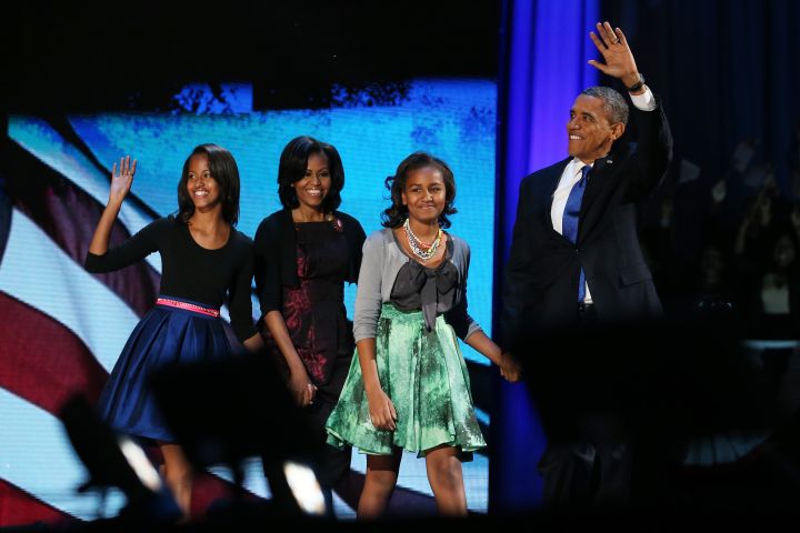 President Obama claims victory on election night alongside winning looks from the girls.
