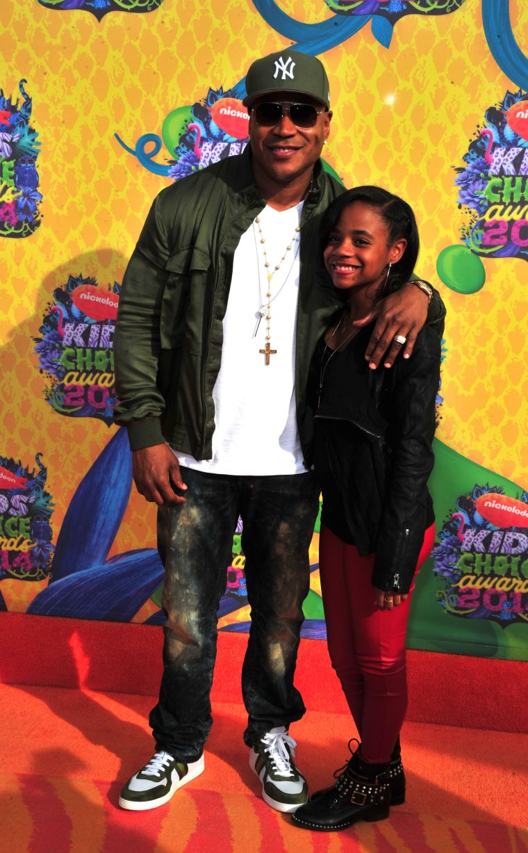 LL Cool J shows some love to his daughter on the orange carpet