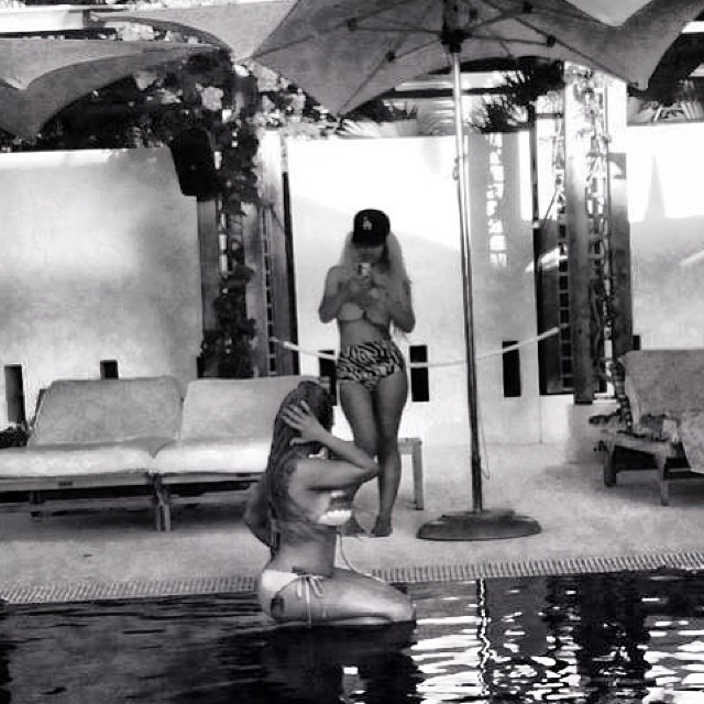 Off guard! Tiny’s backside was caught poolside.