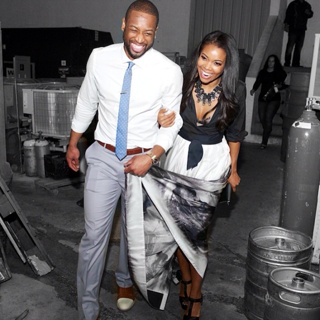 Cheesing hard, the cute couple is always dressed to impress.