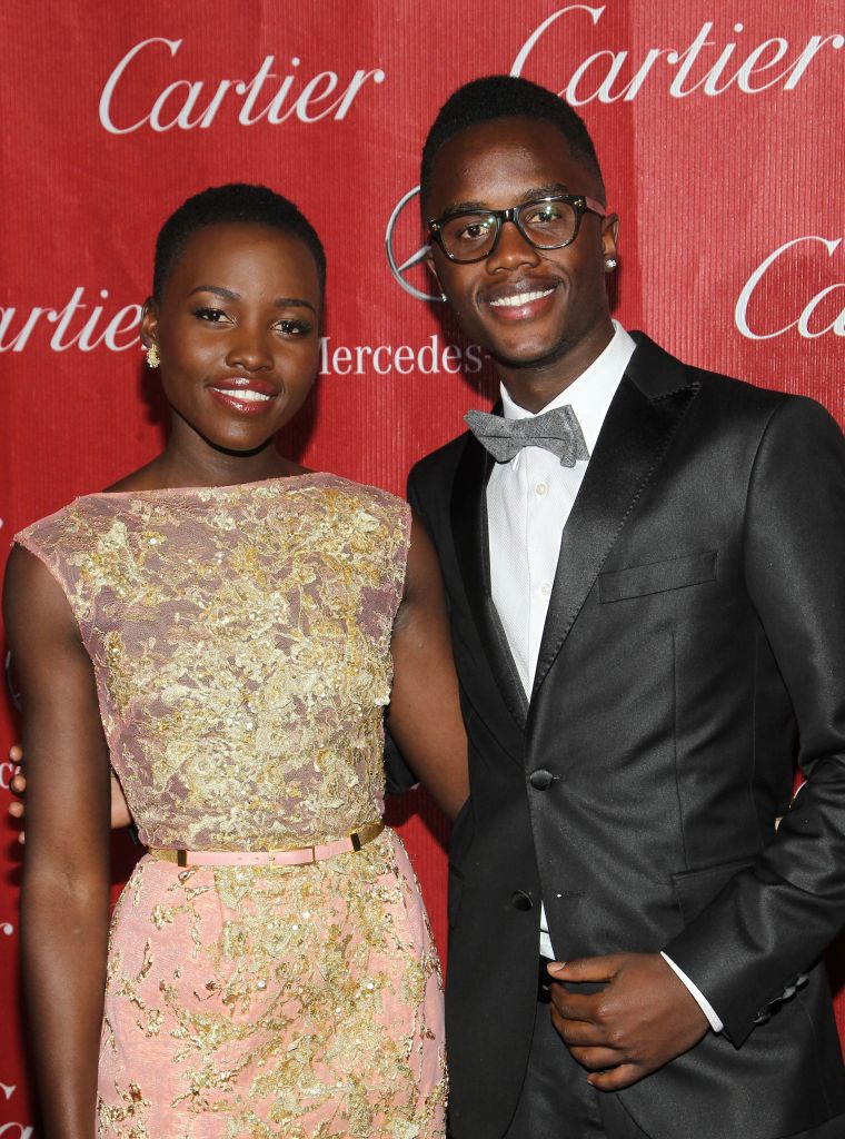 Lupita brought her brother Peter as her date for the Palm Spring Film Festival where she scooped the Breakthrough Performance Award.