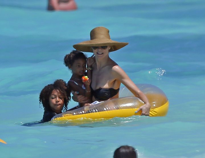 Water tube! Heidi Klum has a good time on the beach with her kids in the Bahamas.