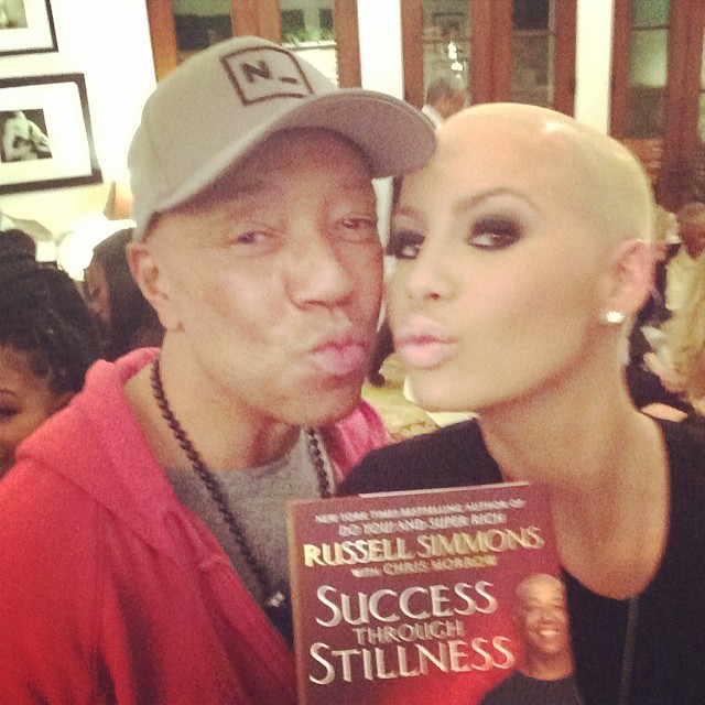 Uncle Rush duck-facing with Amber Rose.