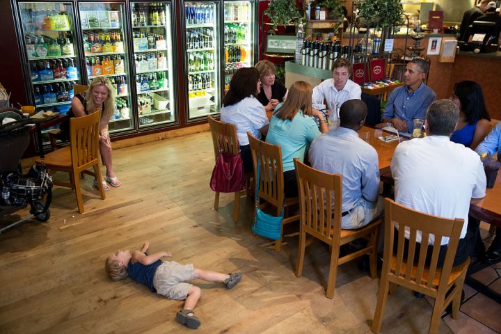 President Obama tries to have a meeting with college students. But this little guy is so intrigued he keeps inching his way into the conversation.