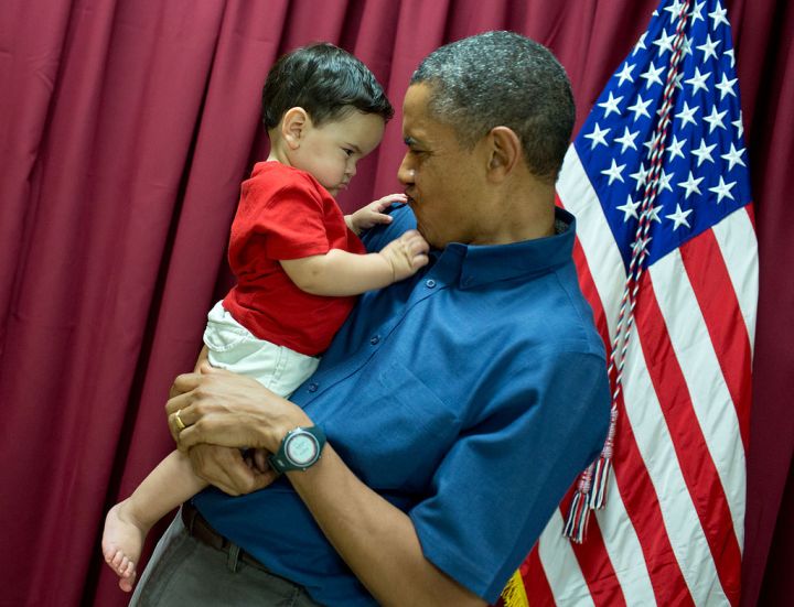 Face/Off! President Obama and one little American have a staring contest.