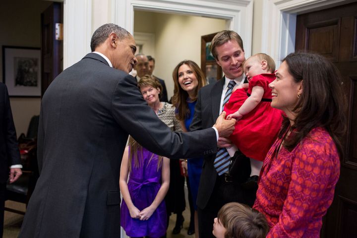 Even the sleepiest of babies don’t miss a chance to meet the president.