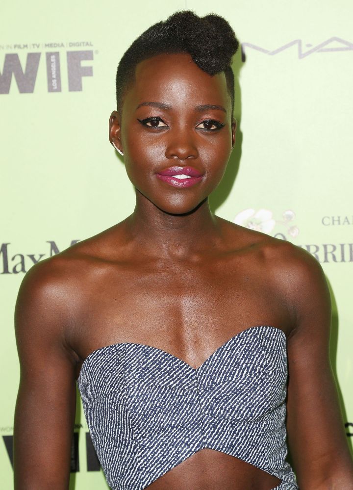 Lupita’s winged eye-liner and funky hair is everything.