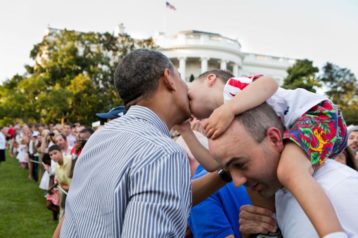 Kisses for the president on the White House lawn.