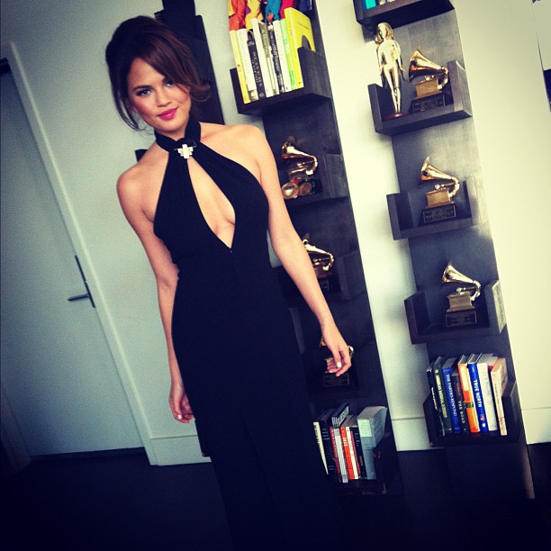 Chrissy shows a little skin for sexy sophistication.
