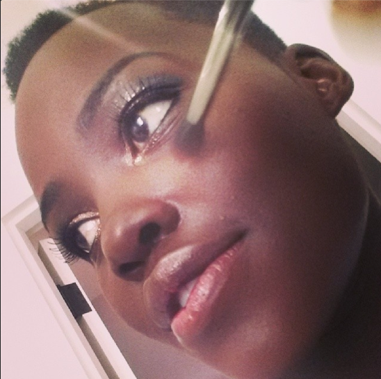 Lupita takes a close-up and puts all of our selfie game to shame.