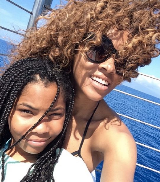 Bria Murphy and family on a boat in Maui