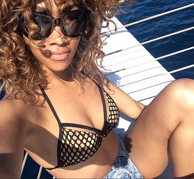 Bria Murphy takes a boat selfie