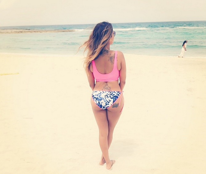 Lala gives us a good glimpse at her backside in the Bahamas