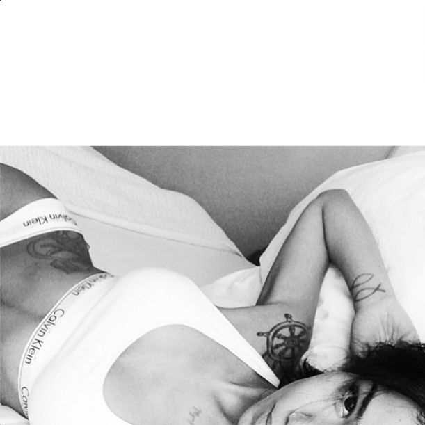 Jhene in her Calvins.