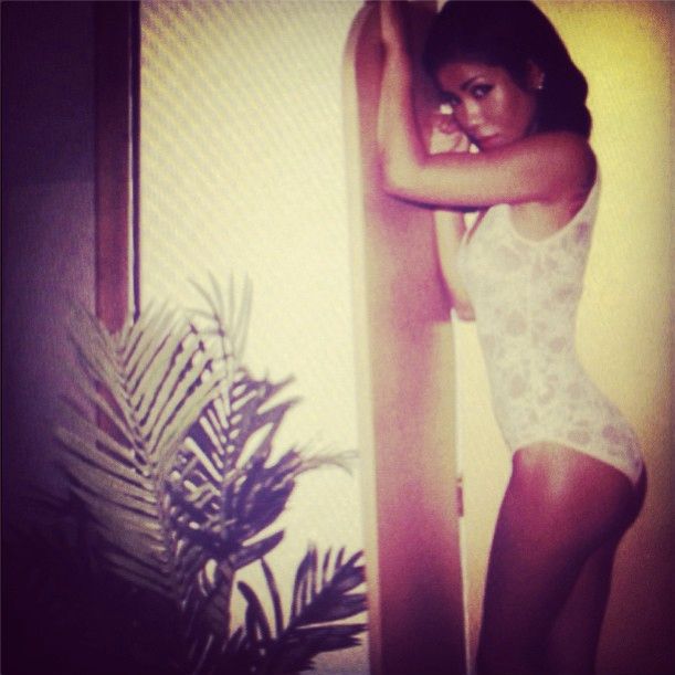 Jhene posts up in a bodysuit.