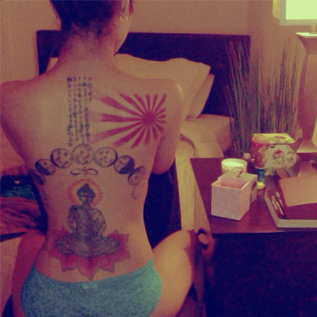 Jhene Aiko shows off her sexy back tattoos.