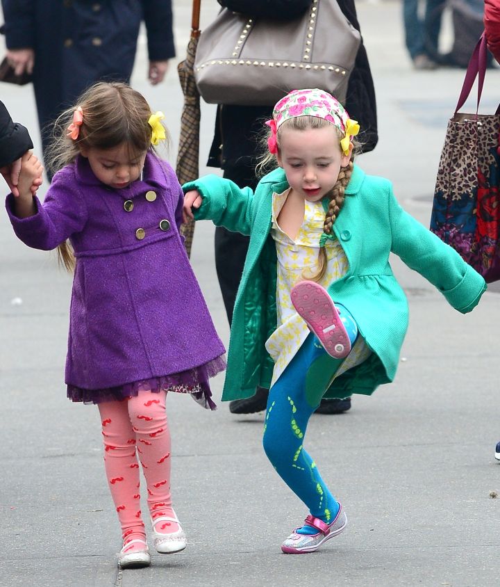 Someone is having a blast! Marion Broderick and Tabitha Broderick are ready for spring on their way to school in the West Village.