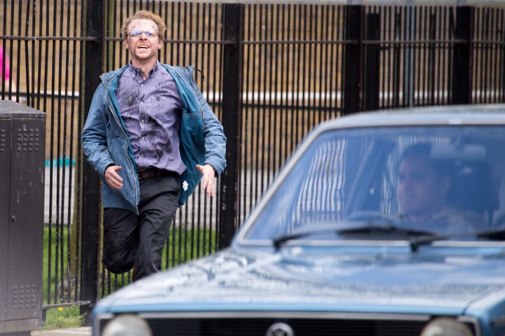 Simon Pegg looks exhausted while filming scenes for the movie “Absolutely Anything” on location in London.