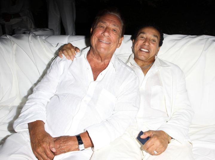 Donald Sterling and Smokey Robinson get close at an all white party for Fred Segal’s birthday party.