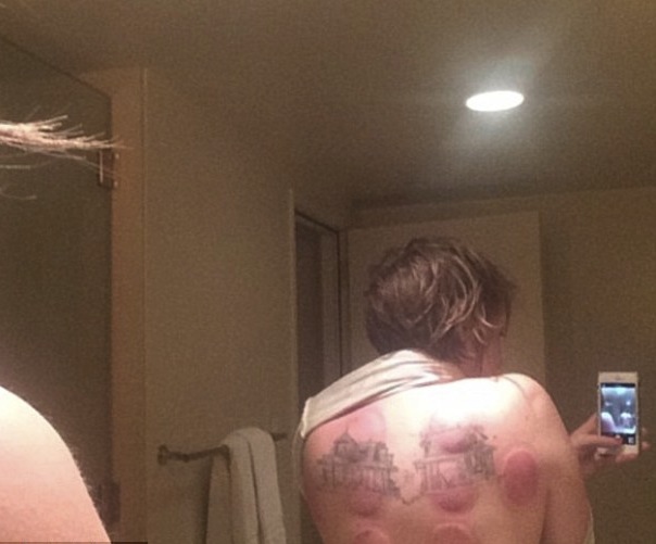 Dunham is tatted, naked, and loving it.