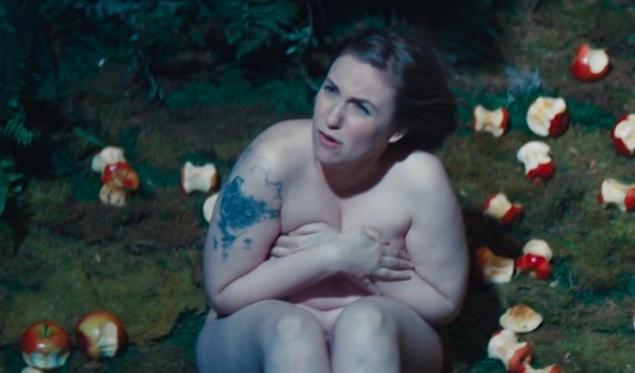 Although she looks as though she’s trying to hide her goodies, Dunham is nude and surrounded by half bitten apples in this Bible-inspired skit from SNL.