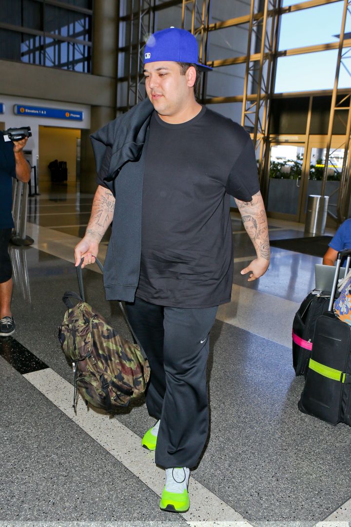 Rob Kardashian arrives at LAX to head to his sister’s wedding on May 18th, 2014.
