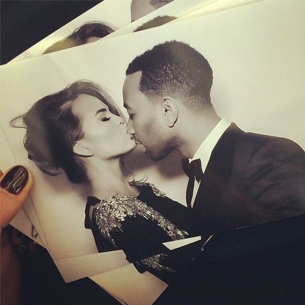Chrissy Teigen gives an adorable kiss to John Legend