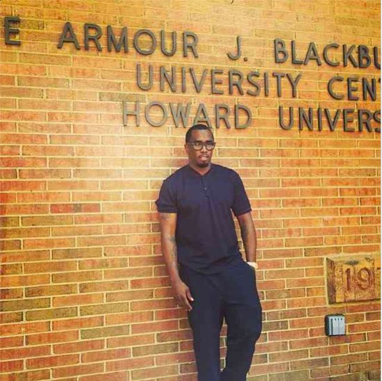 Diddy poses in front of Howard!