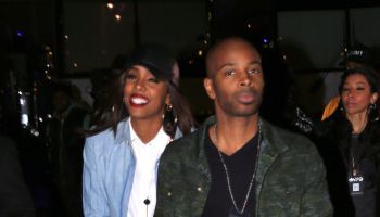 Kelly Rowland Tim Witherspoon holding hands