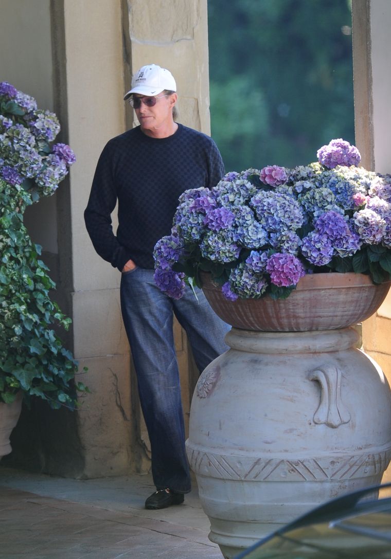Bruce Jenner sends the Kardashian ladies off.