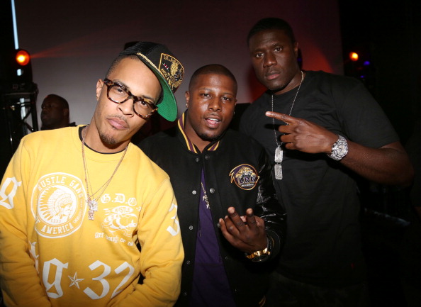 T.I. with the infamous sideways fitted.